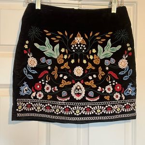 Simplee brown corduroy skirt with colorful embroidery. Size Medium.